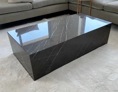 Solid black marble rectangular coffee table (modern, heavy) - good condition corner damage