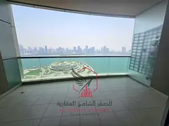 Apartment for annual rent - Al Majaz 3. Features include: air conditioning, parking, gym, free swimm