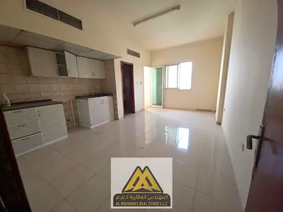 Spacious studio for annual rent in Al Rawda 1, Ajman, near Kenza Mall. Excellent space with balcony