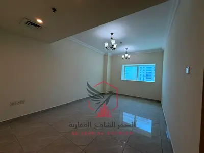 Open view 2-bedroom apartment with living room, parking, and one month free in one of the most beautiful towers in Sharjah