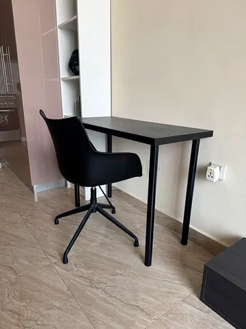 Simple black study desk with swivel chair - excellent condition