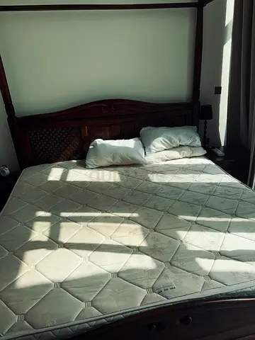 Solid wood king-size four-poster bed with mattress - good condition