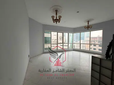 One-bedroom apartment with a living room, one month free, free air conditioning, gym, swimming pool, and kids' area, city view, for rent in Al Majaz 3