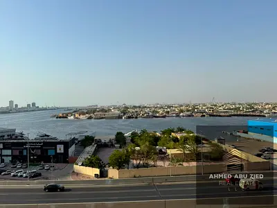 3 bedrooms, including a master bedroom, large living room, maid's room, built-in wardrobes, central air conditioning, balcony with open view, spacious