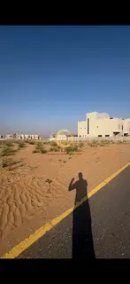 For sale: corner land in Sharjah, Basateen Al Zubeir project, Al Rahmaniyah district. Area: 4,165 sq