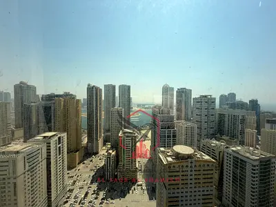 1BR apartment in Al Majaz 3. Sea view, central AC & gas, 2 baths, family tower, near Al Majaz Corniche, free maintenance.