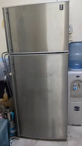 Silver double-door refrigerator, works well, good condition