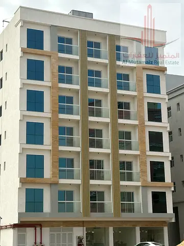 Two-bedroom apartment, hall, and 3 bathrooms in Al Jurf Industrial Area 3, first-inhabitant building