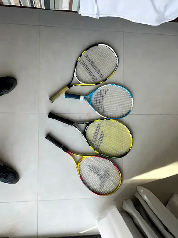Set of 4 used tennis rackets - assorted brands and sizes