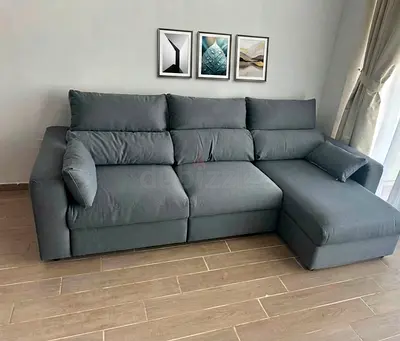 Elegant L-shape sofa with durable construction and soft cushions. Storage included. Custom colors a