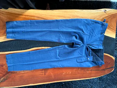 Men's slim-fit blue dress trousers - size not specified