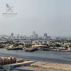 Monthly furnished studio for rent in Al Rashidiya 1, Ajman with clean furniture, balcony, waterfront