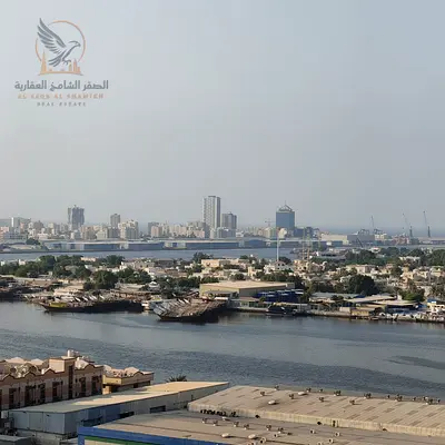 Monthly furnished studio for rent in Al Rashidiya 1, Ajman with clean furniture, balcony, waterfront view, spacious layout, all bills included.