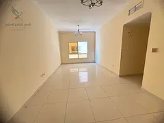 For annual rent in Ajman, a two-bedroom apartment in Al Nuaimiya 1 with a living room, two bathrooms