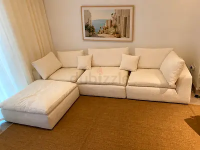 Elegant Feather Filled Modular Sofa featuring spacious seating, soft back cushions, and customizabl