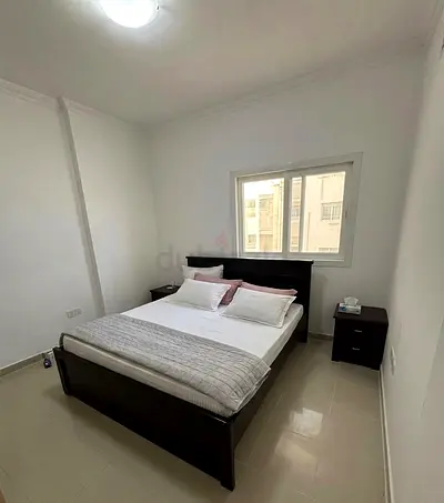 Dark wood double bed frame with mattress (med) two side tables and dressing table - good condition