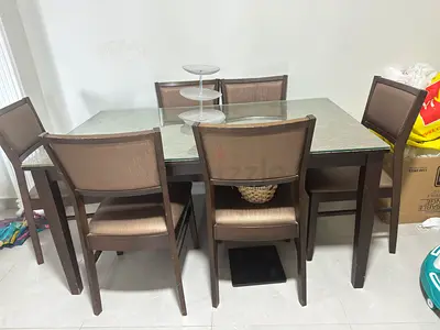 6 Seater Dining Table with Glass Top in good condition