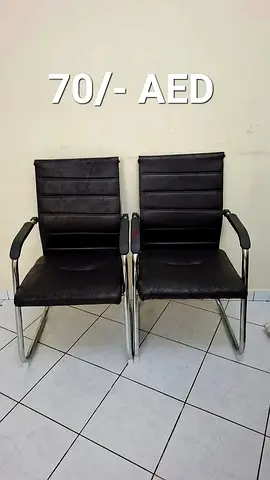 Pair of black office visitor chairs - good condition