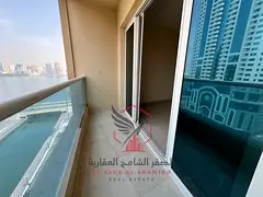 Spacious apartment with two bedrooms and a living room, featuring a sea-view balcony, parking, and s