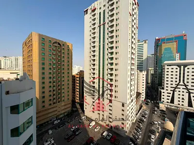 Beautiful 2BR Hall with 2 Balconies Open Views Free AC Free Parking Free Gym Pool Master Maid Room One Month Free