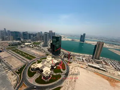 Spacious apartment for annual rent in Al Mamzar, 3 bedrooms and a living room, sea view, free parking, free gym and swimming pool, central air conditi