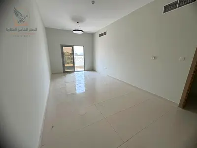 For annual rent in Ajman Al Jurf 2 a 3-bedroom apartment with a living room 4 bathrooms a balcony built-in wardrobes parking