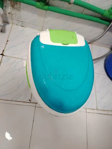 Compact toddler potty seat with lid - used, clean
