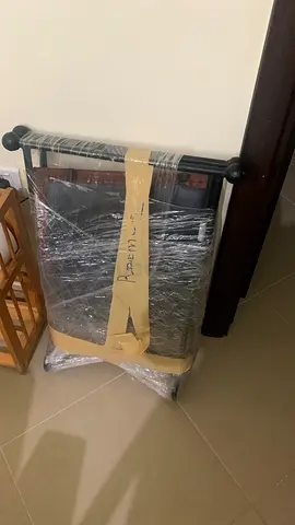 Foldable stool (like-new, wrapped for transport)