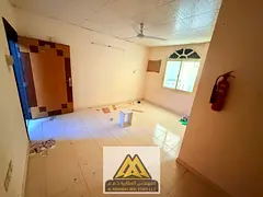 Annual Rent: Ground-floor studio in Al Nuaimiya 1, near Al Ain Hotel & Kuwait Street, maintenance by