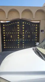 Investment house for sale in Al-Shahbaa; a corner property divided into three apartments.