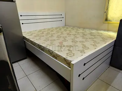 White wooden double bed frame with mattress - good condition