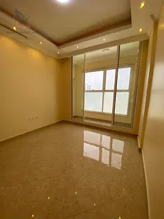 2BR apartment in Al Rawda 3, Ajman, with luxury finishes, private parking, one month free, and easy