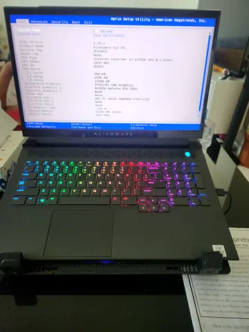 Alienware gaming laptop with an RGB keyboard and Alienware Graphics Amplifier