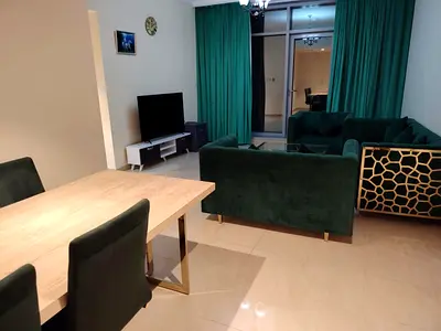 Two bedrooms and a living room | Direct sea view | Laundry room | Built-in wardrobes | Private parking | Residence Towers | Ajman Corniche | 65,000
