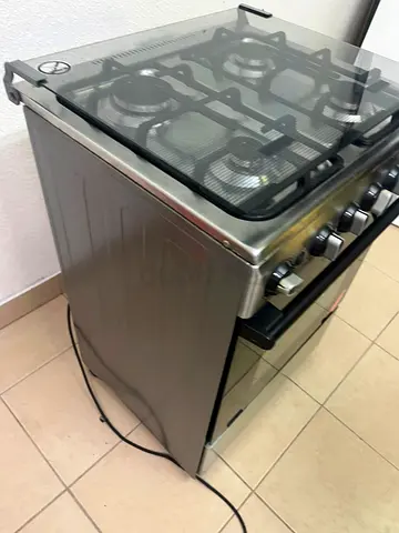 Stainless Steel 4-Burner Gas Cooker with Oven - Good Condition