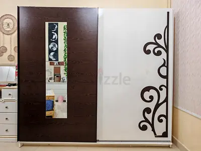 Large Sliding Door Wardrobe with Mirror and Decorative Panel
