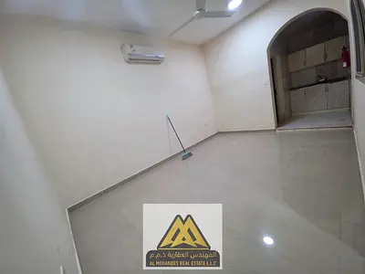 Studio for annual rent in Al Rawda 2, Ajman. Suitable space, split AC, semi-separate kitchen, close