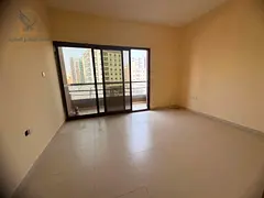 Annual rental apartment in Al Hamidiya with 2 bedrooms, living room, 3 bathrooms, balcony, built-in 