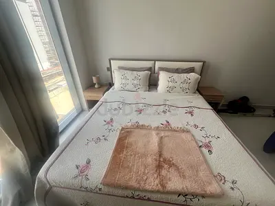 King bed with headboard- 2 night stands - dresser and pouf - light wood