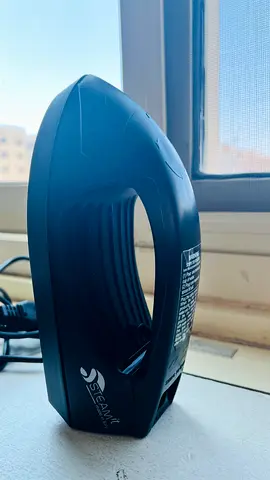 Steamer iron with 2 year warranty bought from City Center