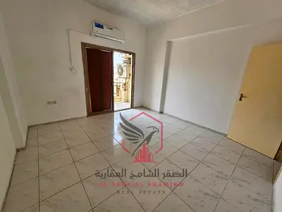 2BR apartment for annual rent with built-in wardrobes, open view balcony, close to all amenities, and free maintenance all year round.