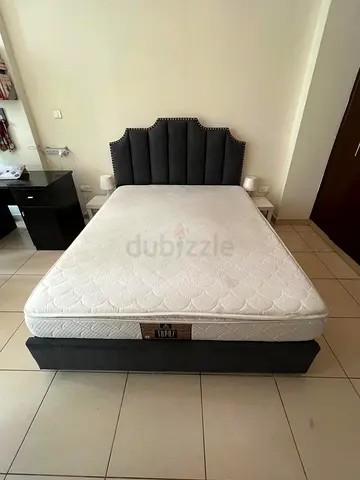 Queen upholstered bed frame with mattress - good condition