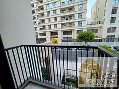 Two-bedroom apartment for sale or rent in Maryam Island, featuring two balconies, a laundry room, a 
