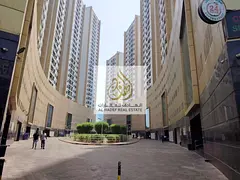 Two rooms and a hall for annual rent in Pearl Towers with parking