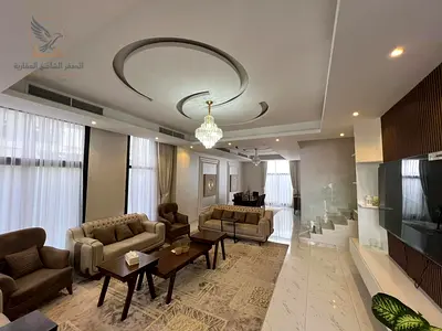 فيلا مفروشه بالكامل جاهزه للسكن مباشرة مساحه واسعه باركن مغطي موقع مميز علي مخرج دبي والشارقه