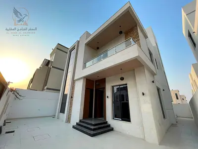 Annual rental in Ajman Brand new villa in Al Bahia with four master bedrooms maid room majlis roof lounge equipped kitchen built in wardrobes central