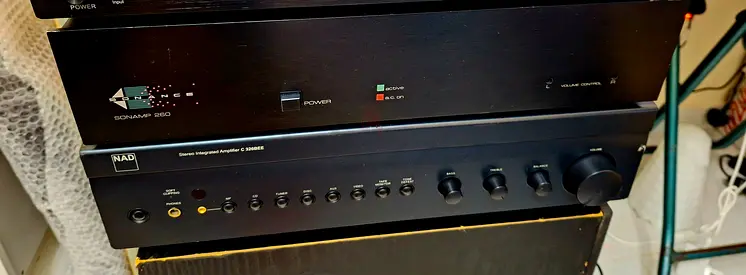 Nad c326bee stereo integrated amplifier and Sonance sonamp 260 stereo power amplifier.