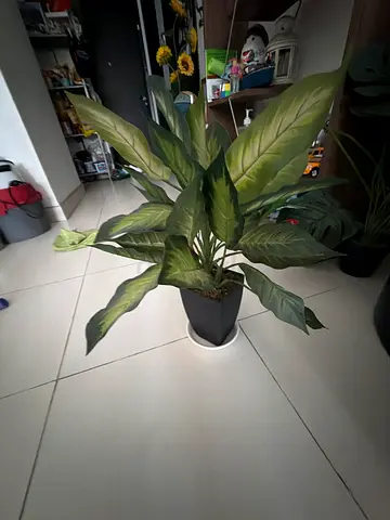 IKEA Tall artificial green potted plant in black planter