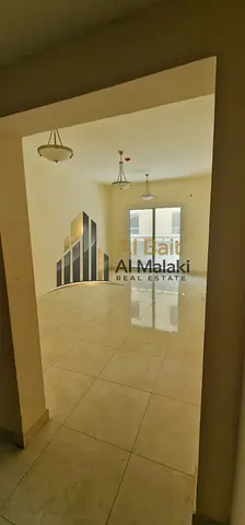 شقة غرفتين وصالة مع بلكونة وباركن مجاني | ثاني ساكن في التعاون