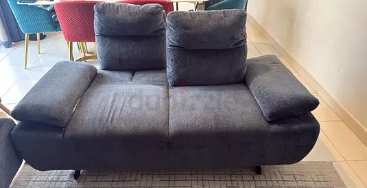 Dark gray 2-seater fabric sofa in good condition